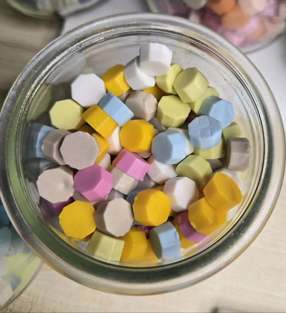 imagine sitting on the beach at sunset, the sand under your toes as you look across the calm water and see the sky turn to pinks and yellows as the sun and moon meet to paint the sky