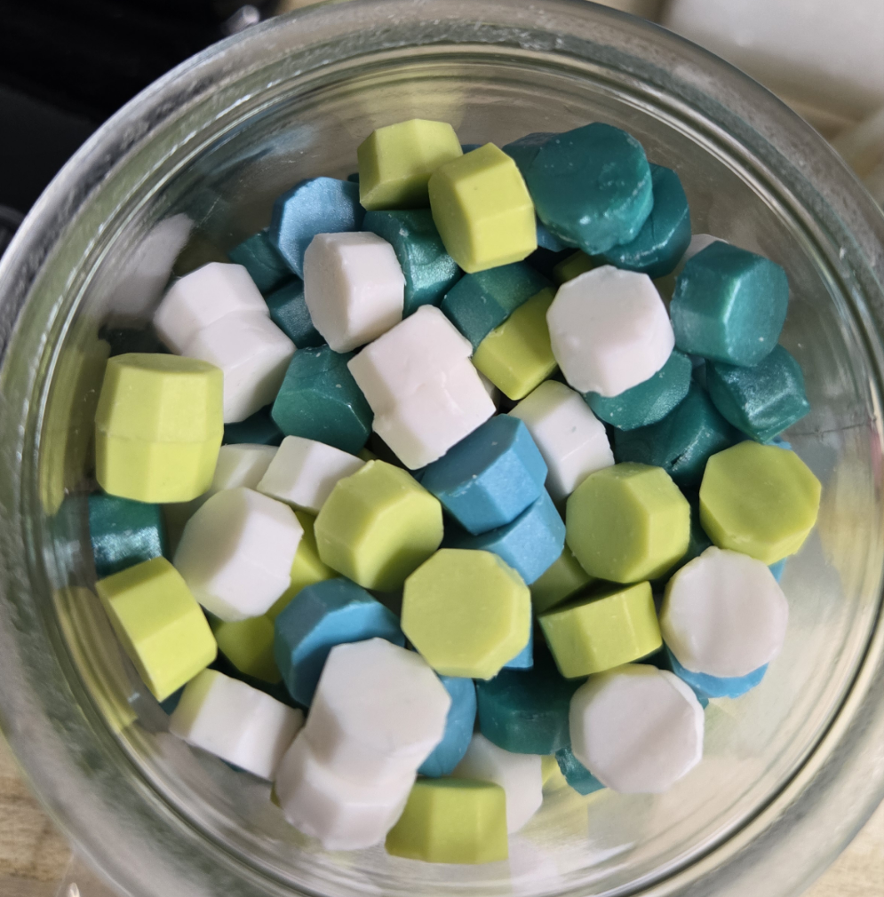 a dazzling blend of white, teal, and lime green wax seal beads, bursting with pearlescent shimmer and the vibrant energy of Brazil’s iconic celebration—like confetti in motion and samba in color.