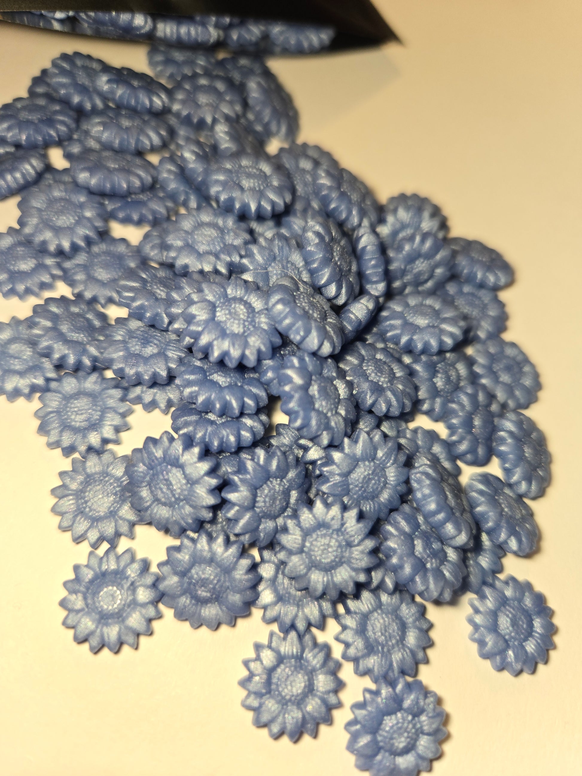 a soft blue with a gentle periwinkle undertone—evoking blooming wildflowers under spring skies, delicate yet quietly radiant