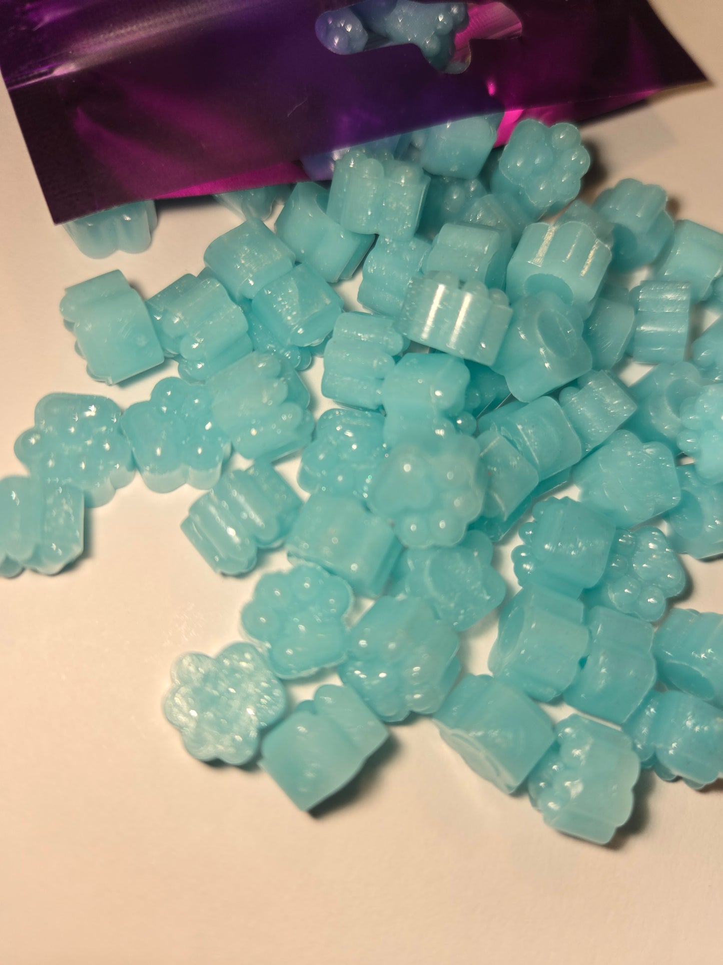 a delicate, glacial-toned wax seal bead with a sheer, misty finish that evokes the clarity of geothermal waters and the ethereal calm of Nordic air—cool and clean