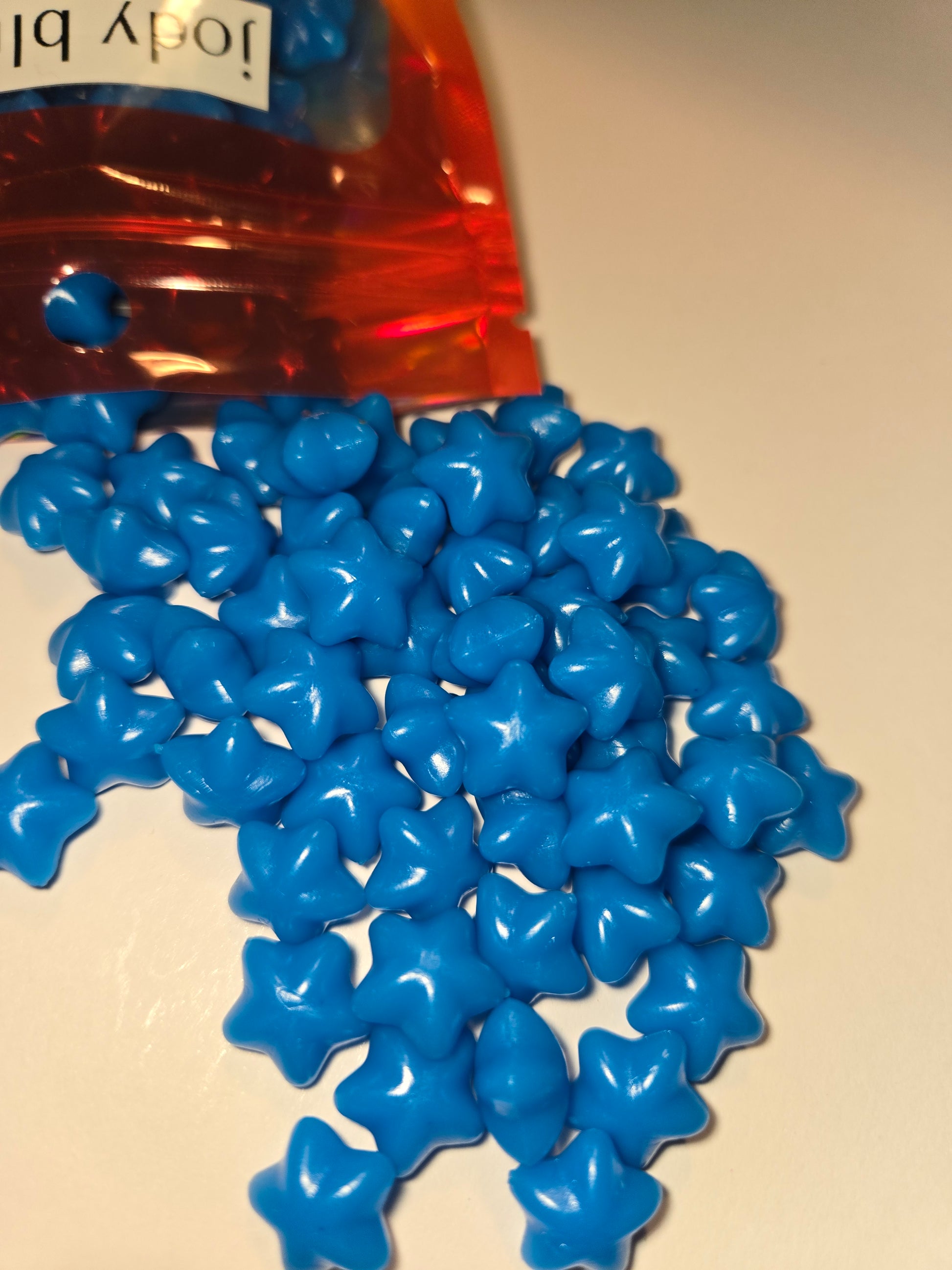 a brilliant, glossy blue wax seal bead named in honor of a cherished customer. It radiates loyalty and vibrance—like a sapphire wave catching the light, bold and unforgettable.