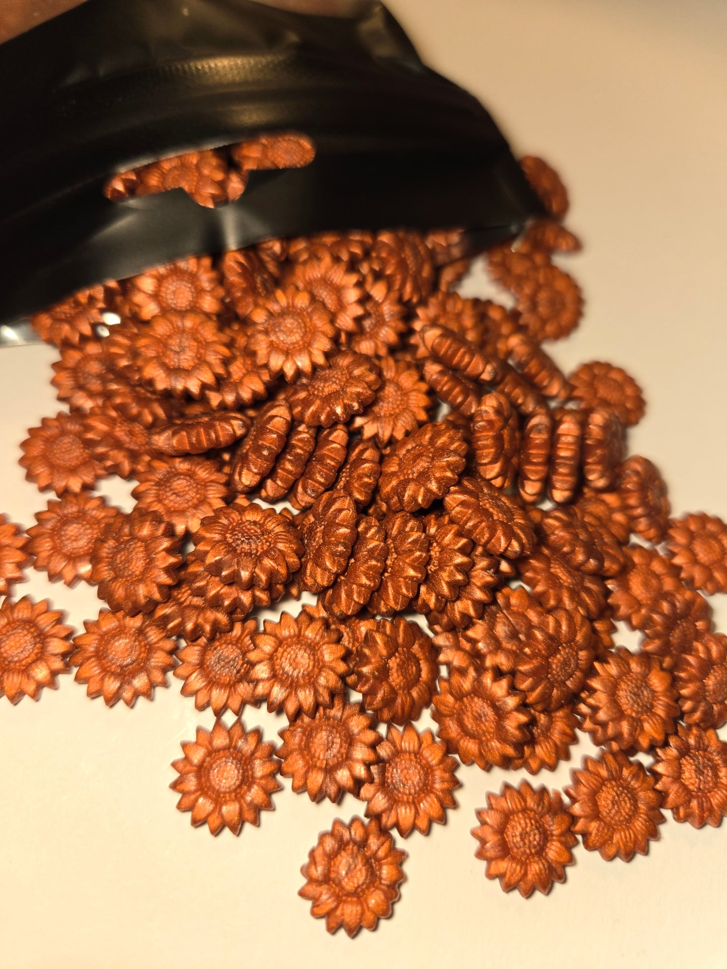 a warm, aged copper wax seal bead with earthy undertones and a subtle metallic glow—evoking weathered bronze statues and timeless elegance kissed by time.