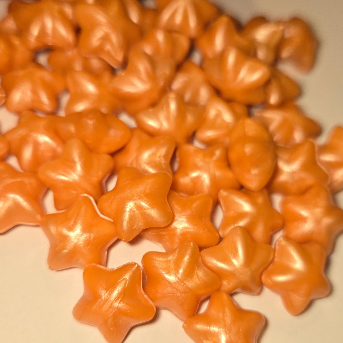 a  creamy warm orange that brings on vibes of the favored autumn drink